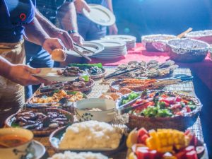Enjoying a delicious BBQ feast by the bay.